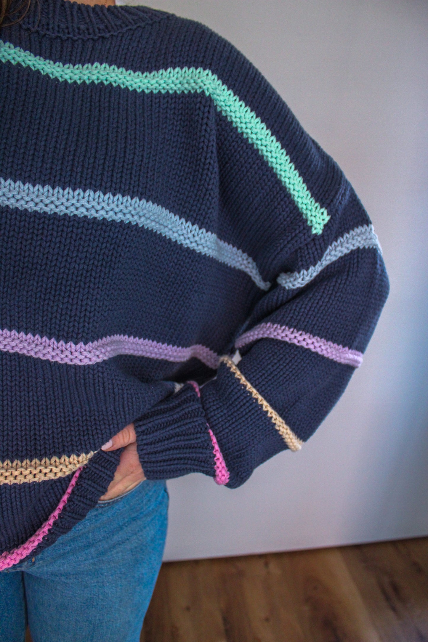 CLOUD NINE STRIPED SWEATER