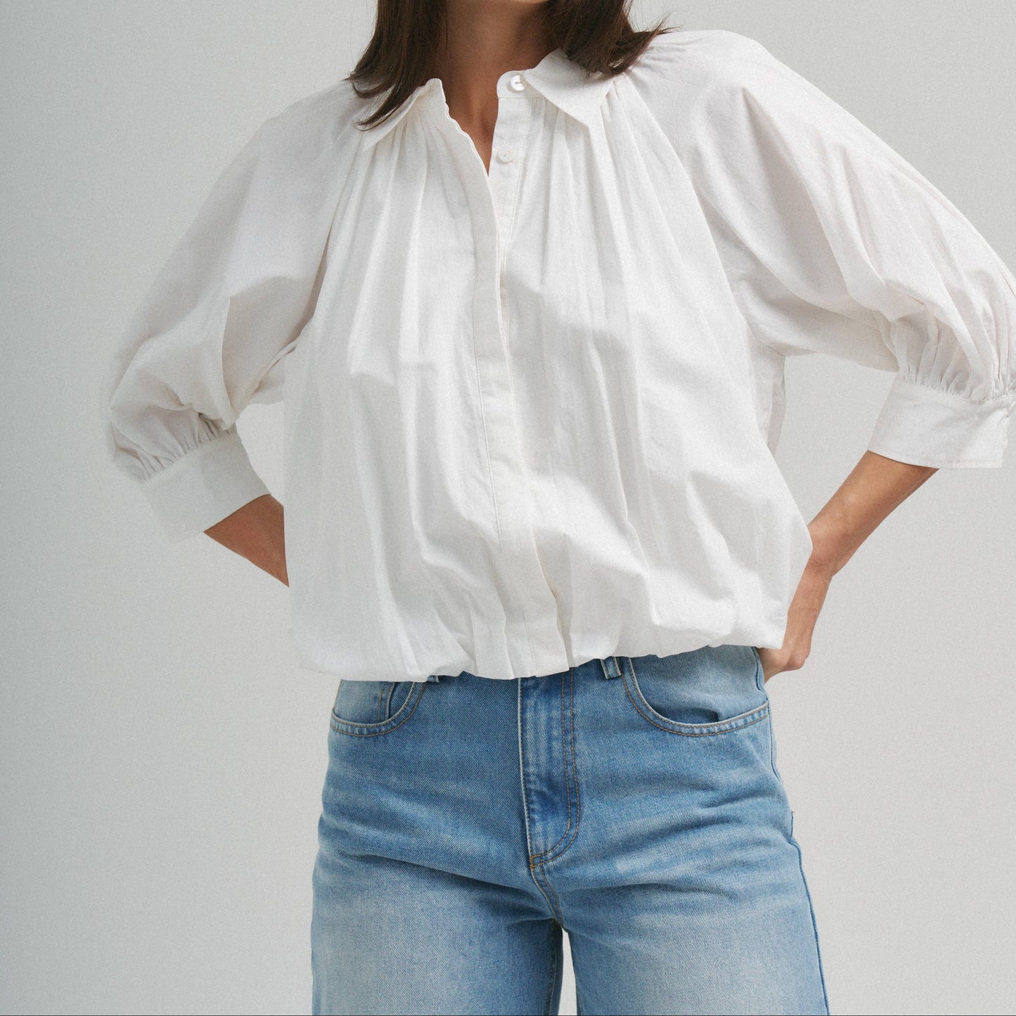 MEET ME DOWNTOWN BUBBLE HEM BLOUSE