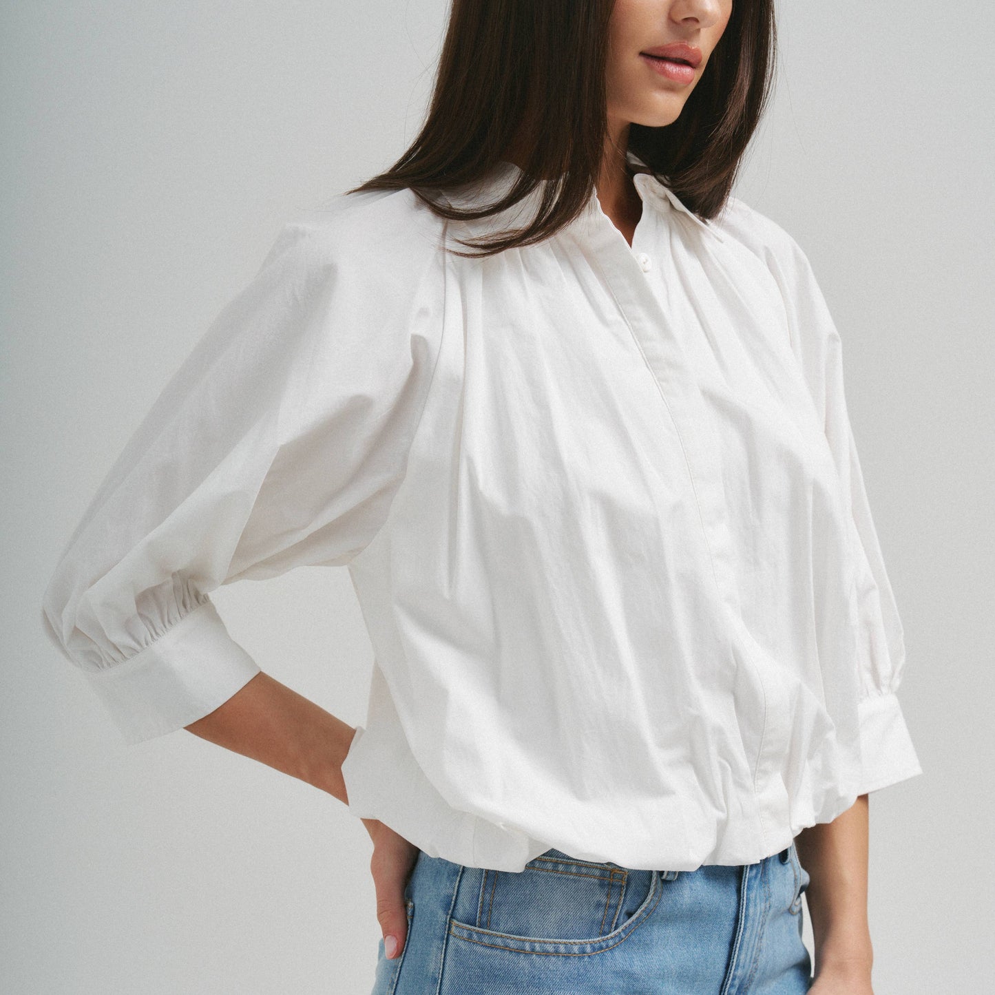 MEET ME DOWNTOWN BUBBLE HEM BLOUSE