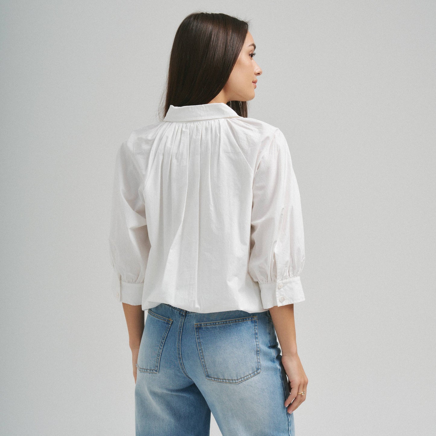 MEET ME DOWNTOWN BUBBLE HEM BLOUSE